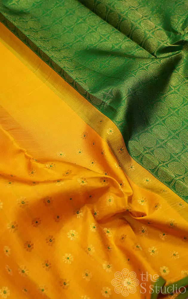 Yellow meena butta kanchipuram silk saree with green selvedge