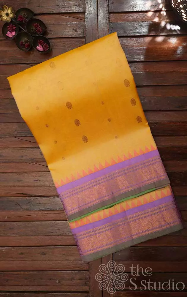 
Yellow gadwal silk saree with lavender border