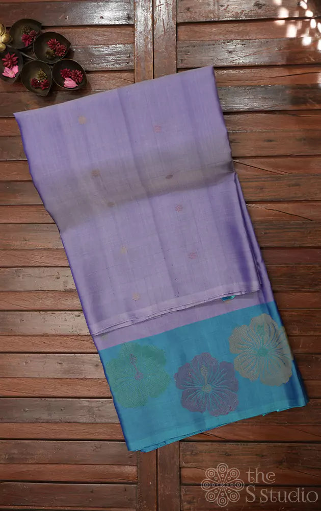 Lavender soft silk saree with light blue border