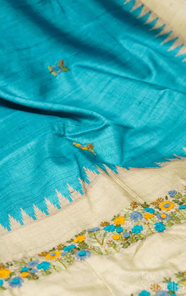 Blue semi tussar saree with floral embroidery