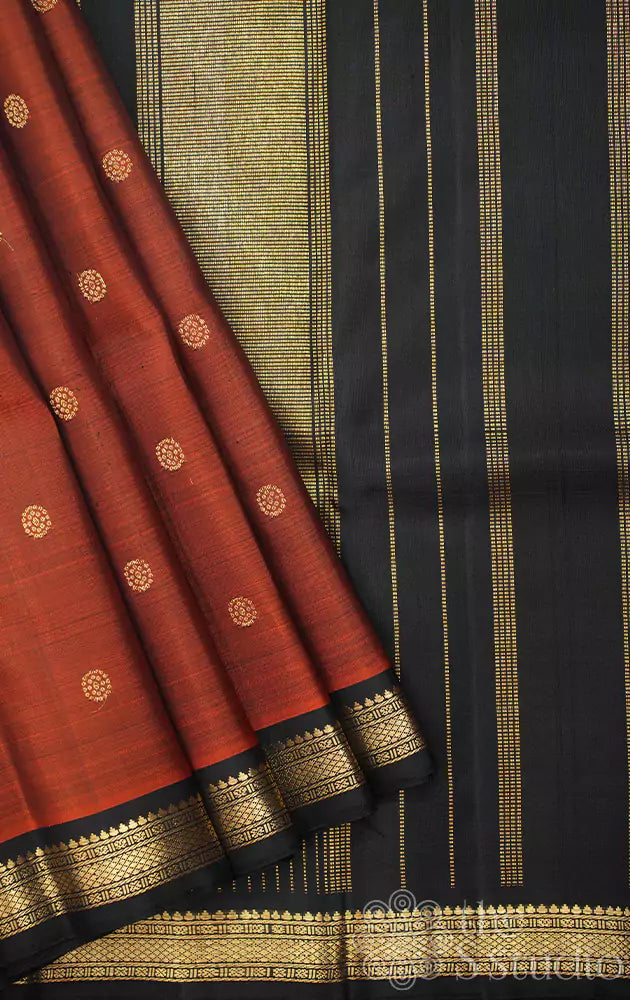 Rust kanjivaram saree with small black border