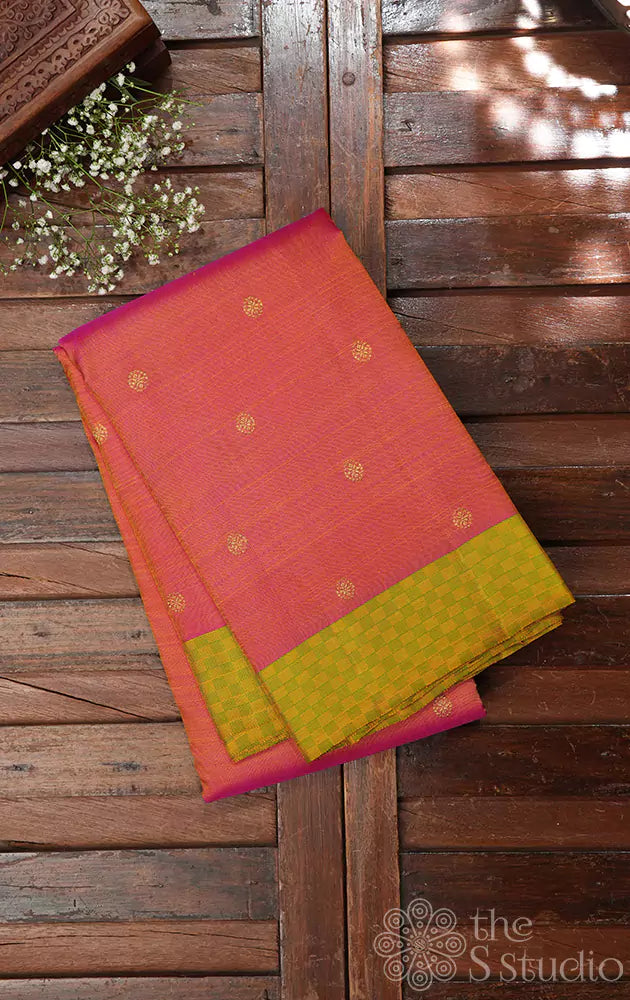 Peach kanjivaram silk saree with parrot green border