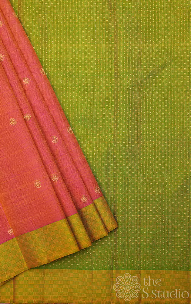 Peach kanjivaram silk saree with parrot green border