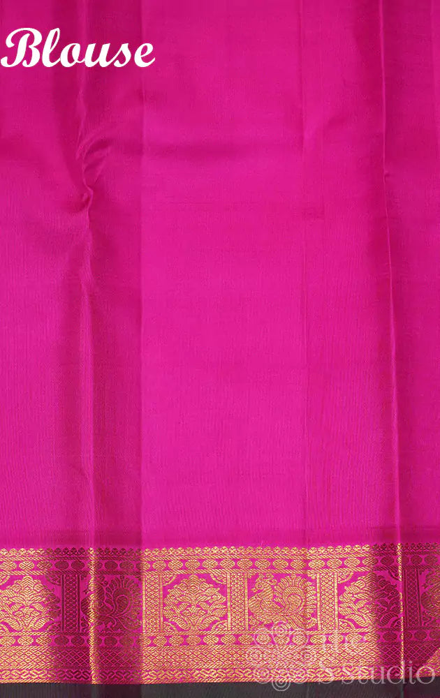 Light pink kanchipuram silk saree with dark pink border