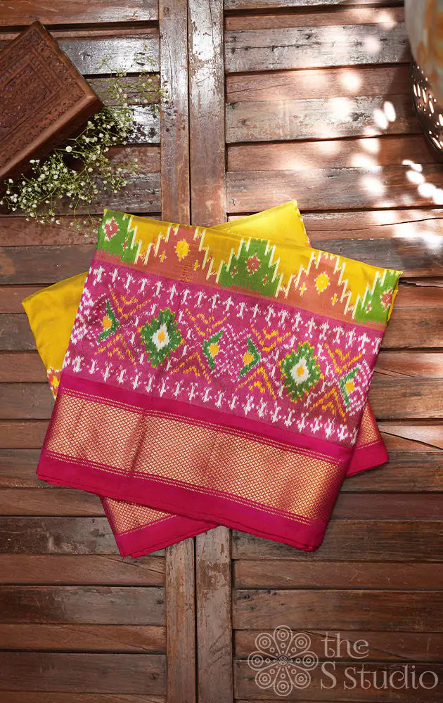 Mustard ikkat silk saree with rani pink zari border