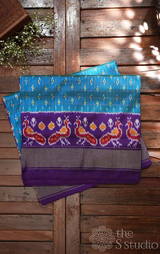 Light blue checked ikat silk saree with violet border