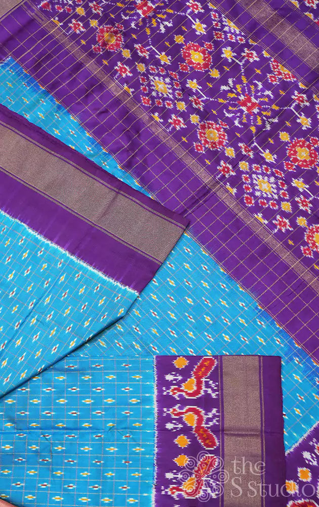 Light blue checked ikat silk saree with violet border