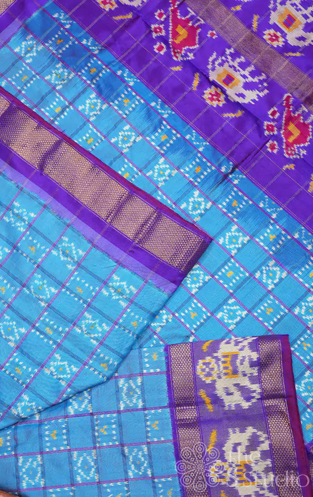 Light blue checked ikkat saree with elephant motif border