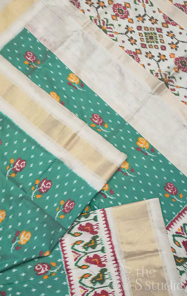 Sea green ikkat silk saree with gold zari border