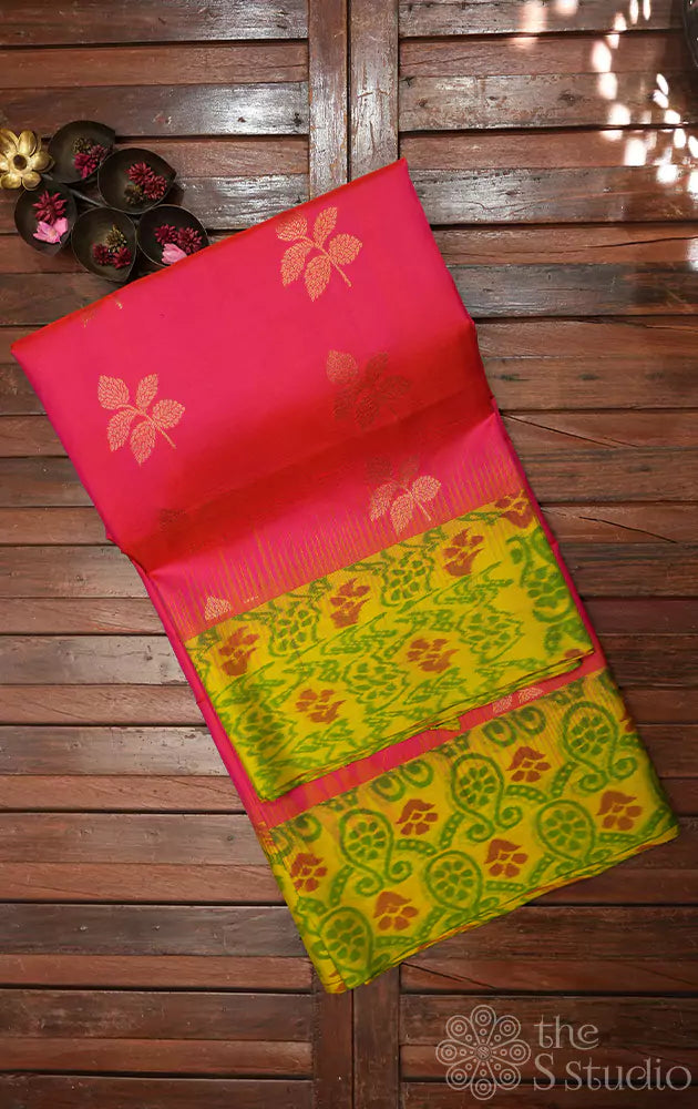 Reddish peach soft silk saree with lime green ikat woven border