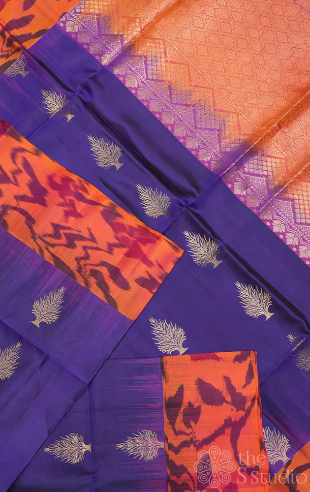 Navy blue soft silk saree with orange ikat woven border