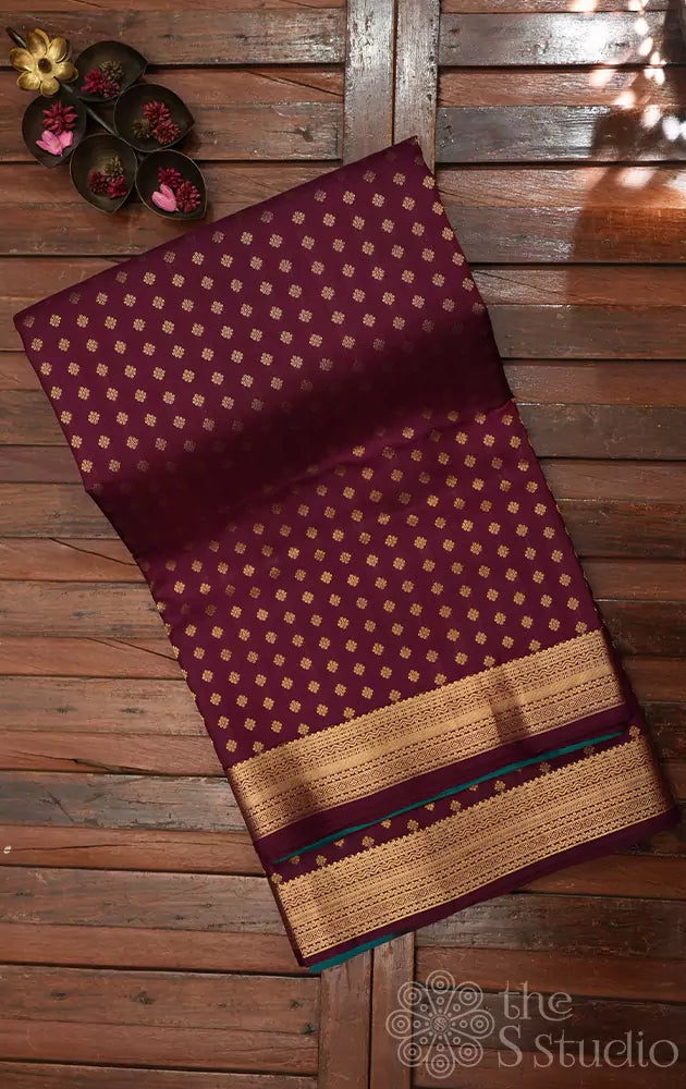 Purple soft silk saree with zari woven border