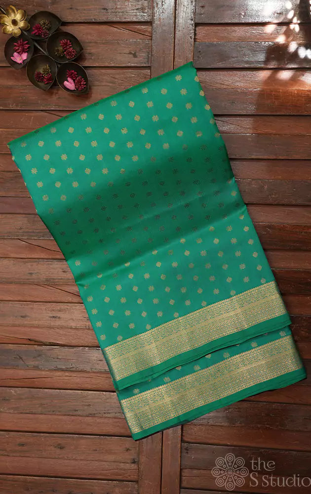 Teal green soft silk saree with small zari buttas