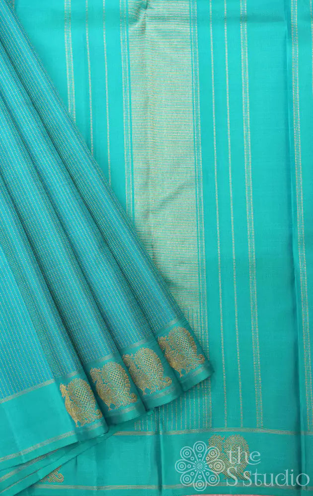 Sea green kanchi silk saree with long thread lines