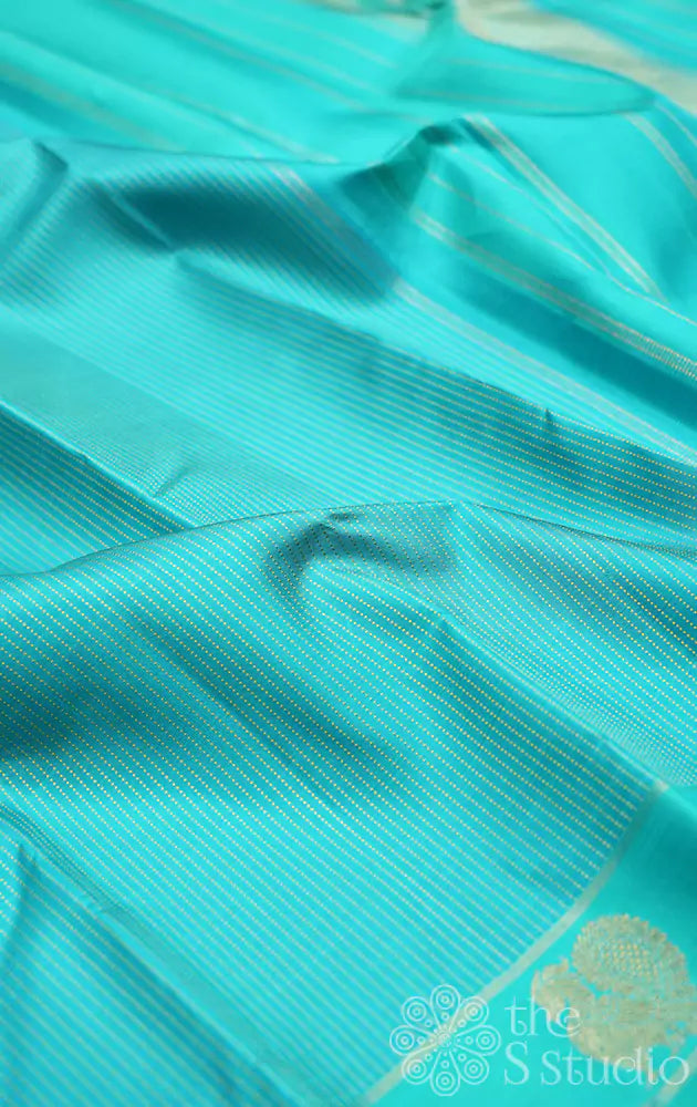 Sea green kanchi silk saree with long thread lines