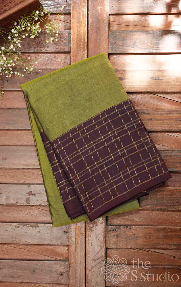 Methi green kanchi silk saree with brown checked border