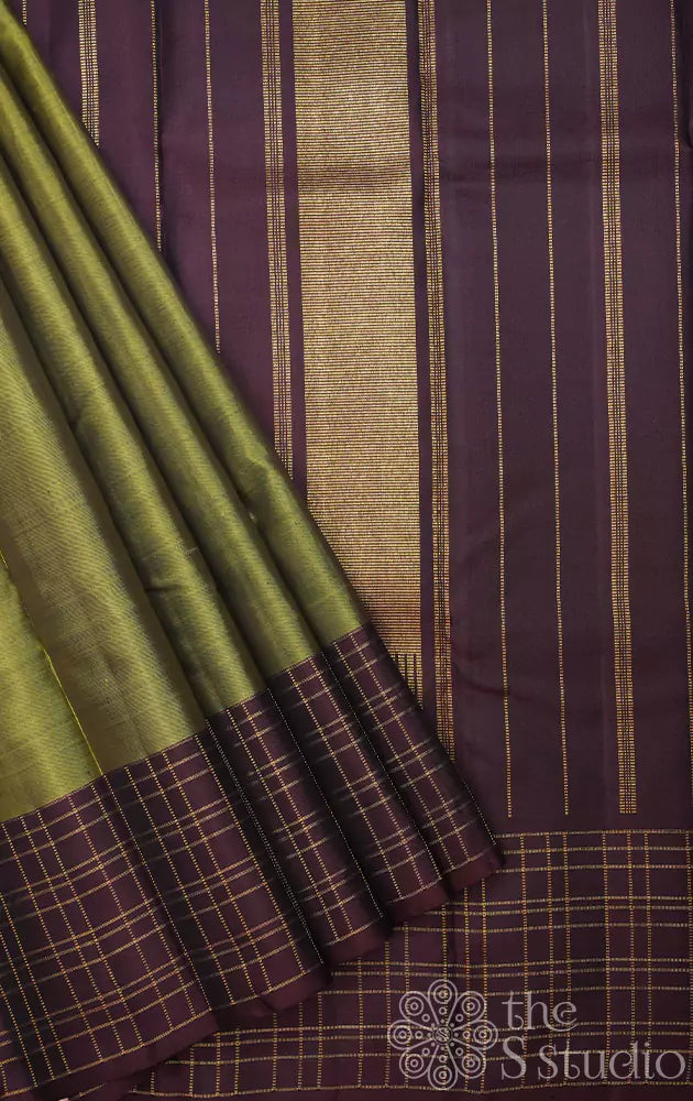 Methi green kanchi silk saree with brown checked border