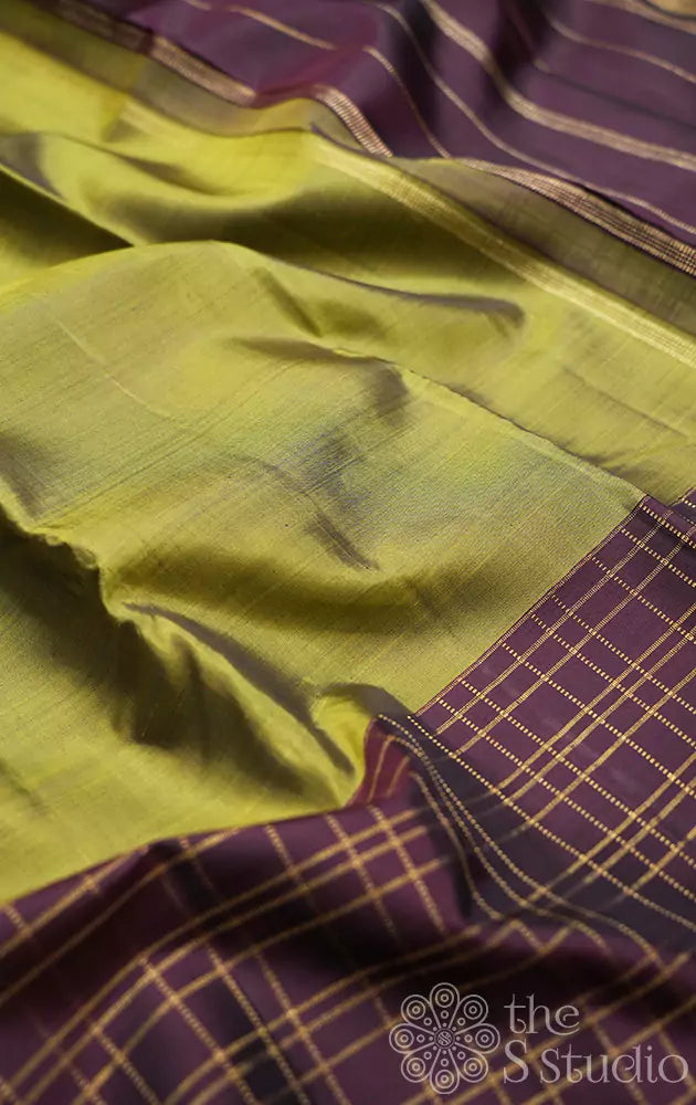 Methi green kanchi silk saree with brown checked border