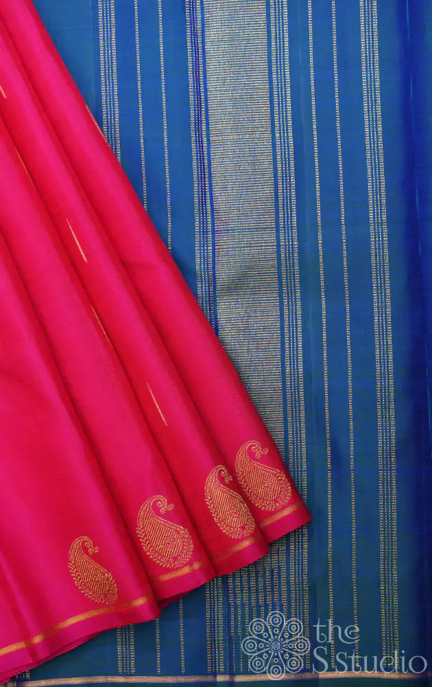 Rani pink kanchi silk saree with paisley zari motifs along the border