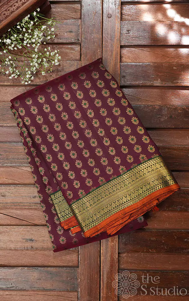 Maroon kanjivaram silk saree with small zari buttas and green border