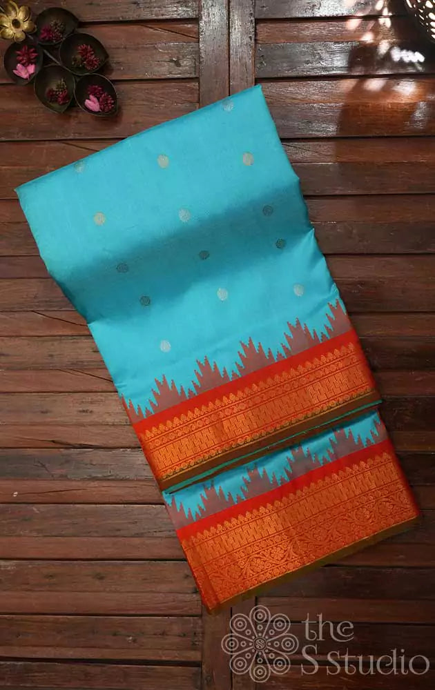 Blue gadwal silk saree with red border