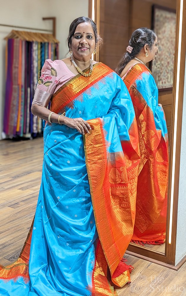 Blue gadwal silk saree with red border