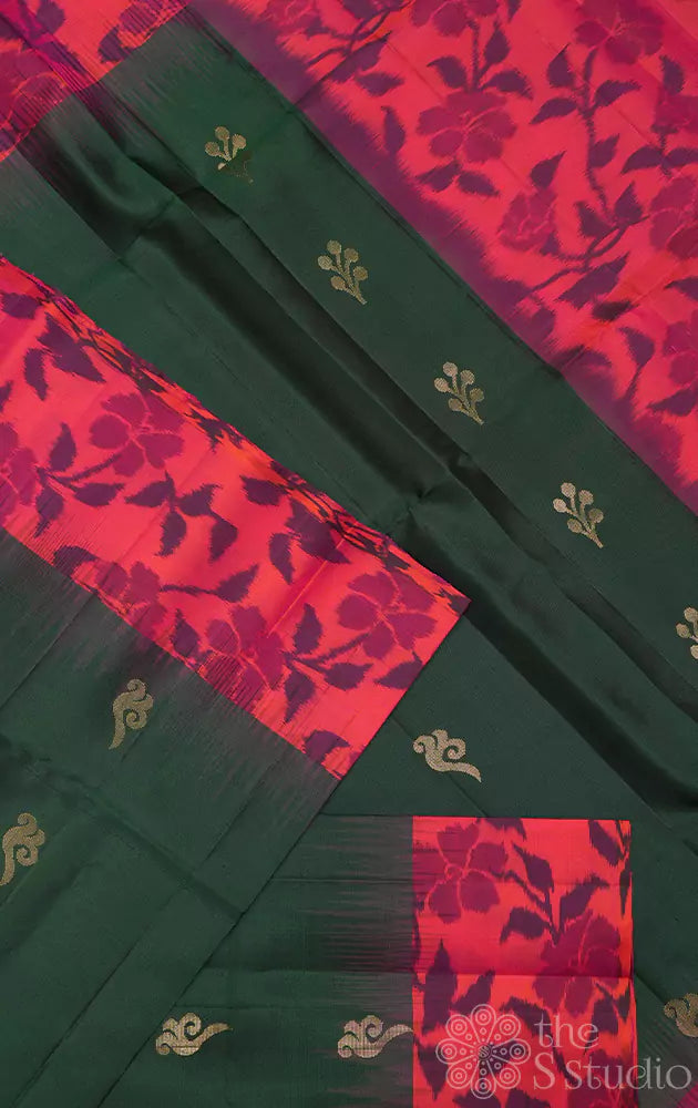 Dark green soft silk saree with peach ikkat woven border