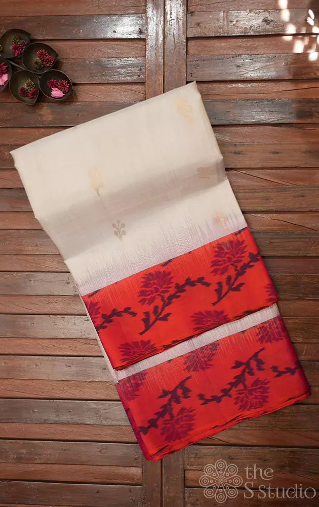 Beige soft silk saree with red ikkat woven border