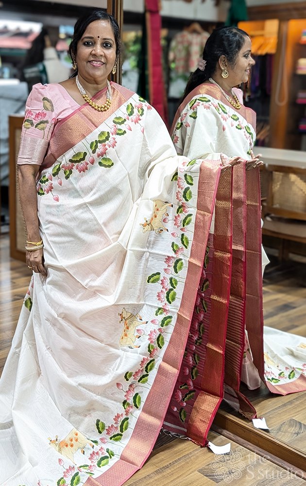 Off white handpainted maheshwari silk cotton saree with red border