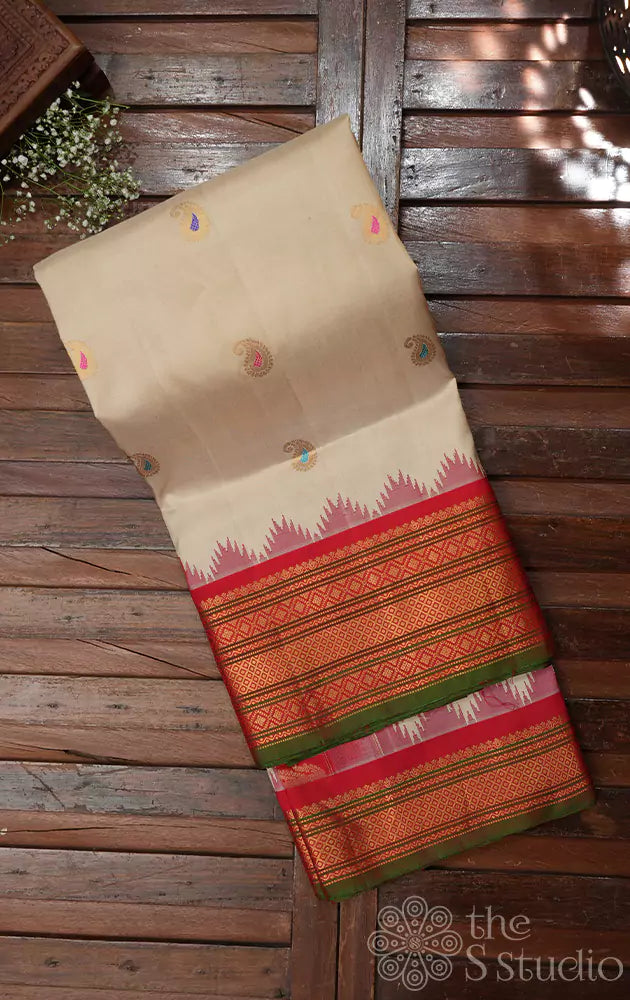 Beige gadwal silk saree with red border