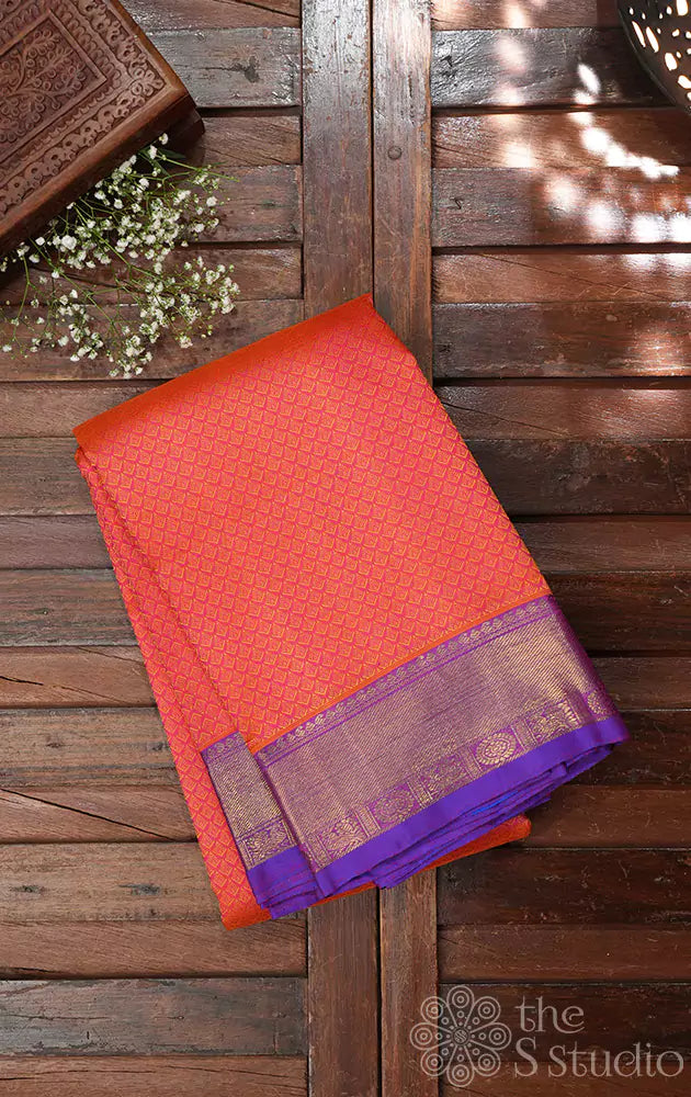 Orange threadwork kanchi silk saree with purple border