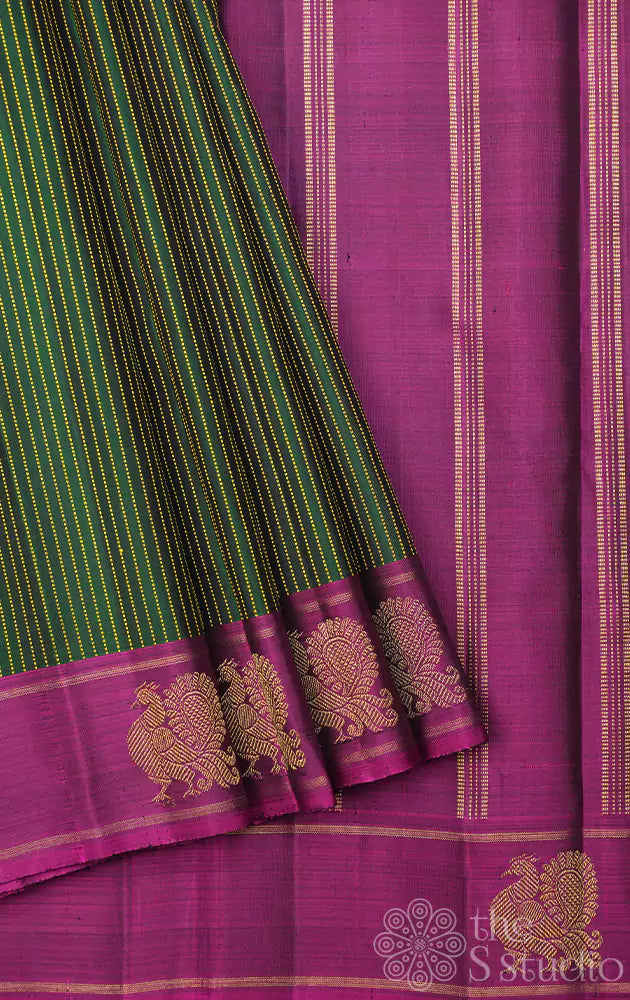 Dark green kanchipuram silk saree with vertical thread lines