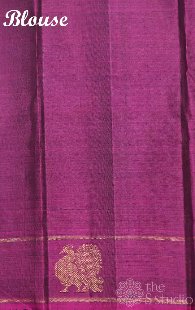 Dark green kanchipuram silk saree with vertical thread lines