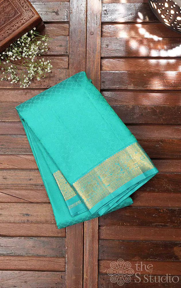 Sea green kanjivaram silk saree with zari border