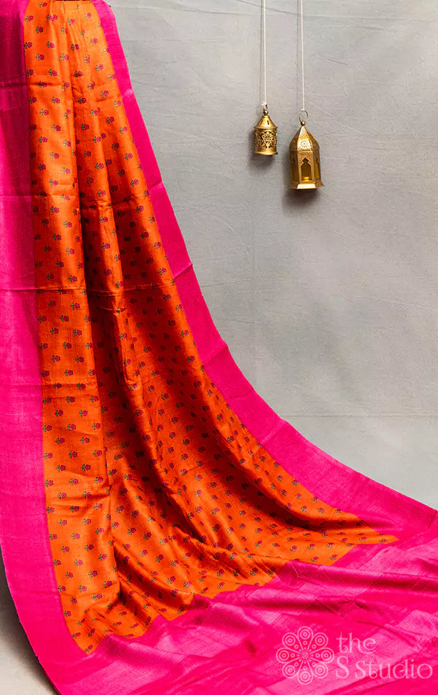 Orange tussar silk saree with contrast pink border