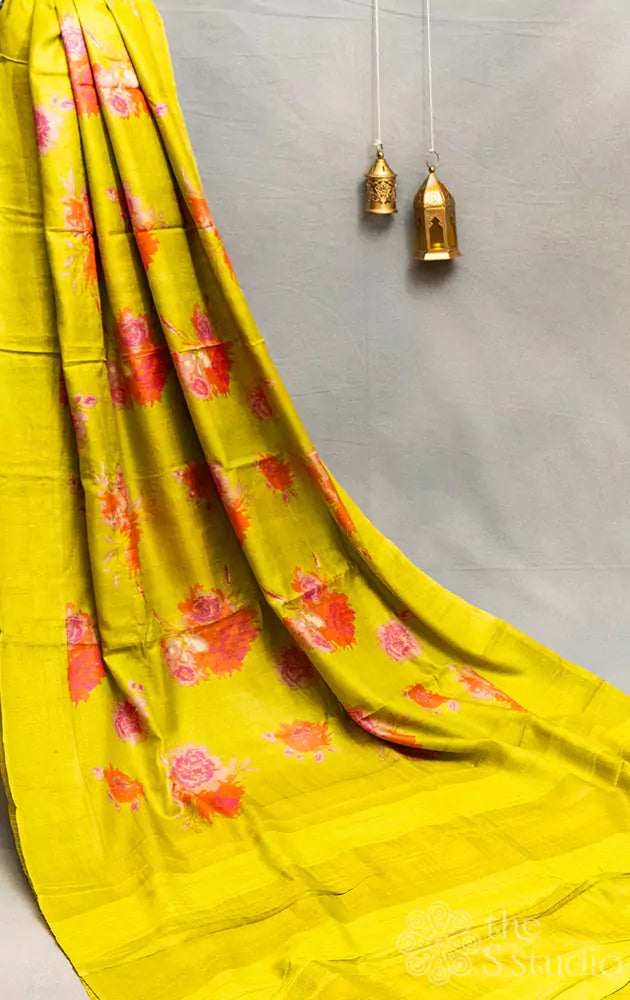 Lime green tussar silk saree with floral prints