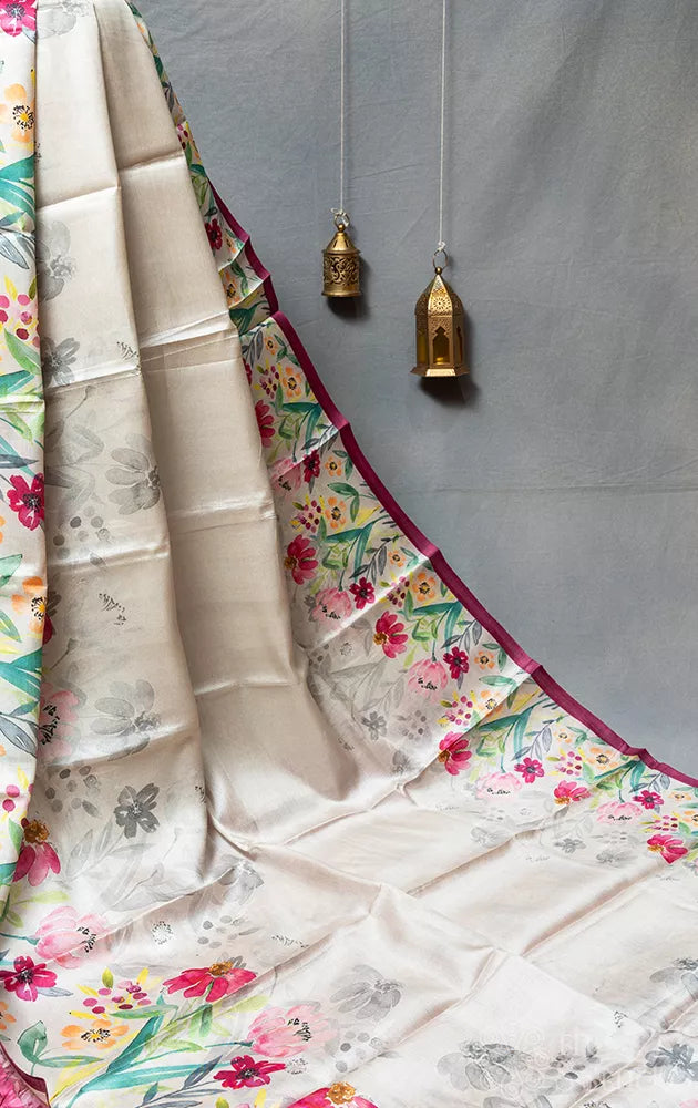 Light grey tussar silk saree with floral prints and dark pink selvedge