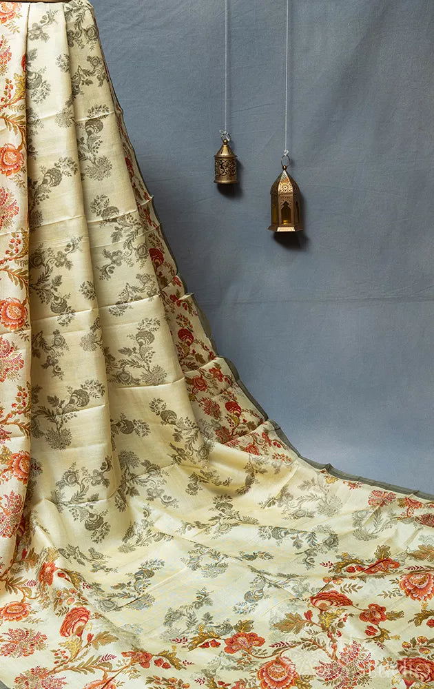 Light yellow tussar silk saree with floral prints