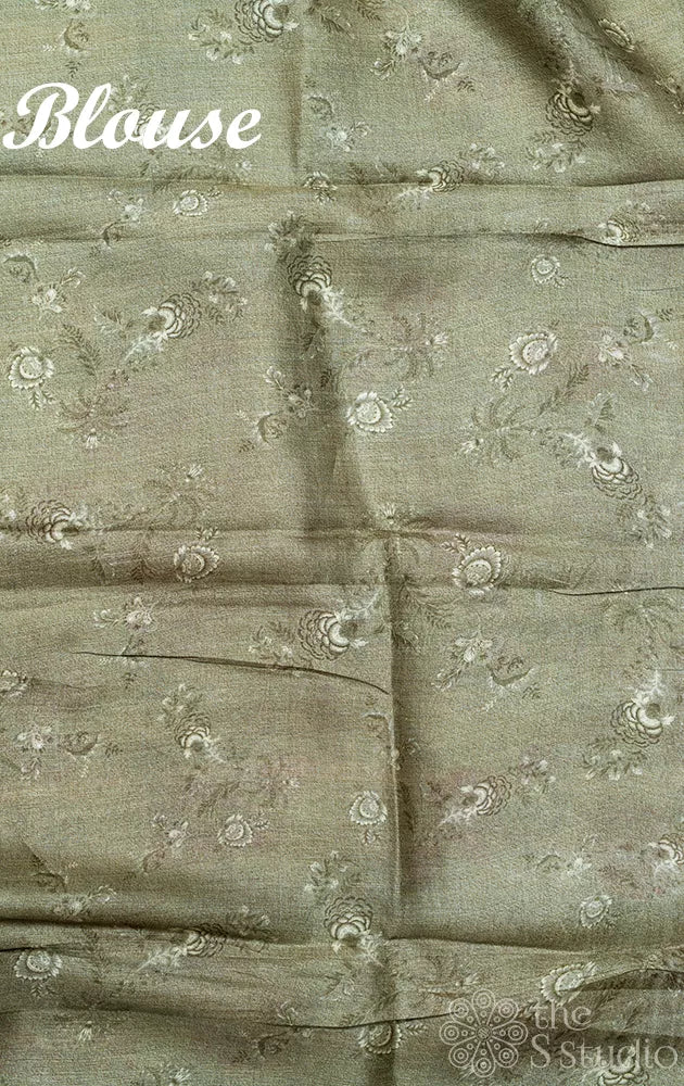 Light yellow tussar silk saree with floral prints