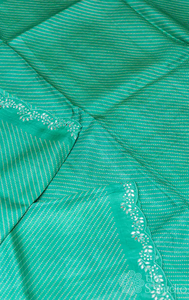 Sea green tussar silk saree with scallop border