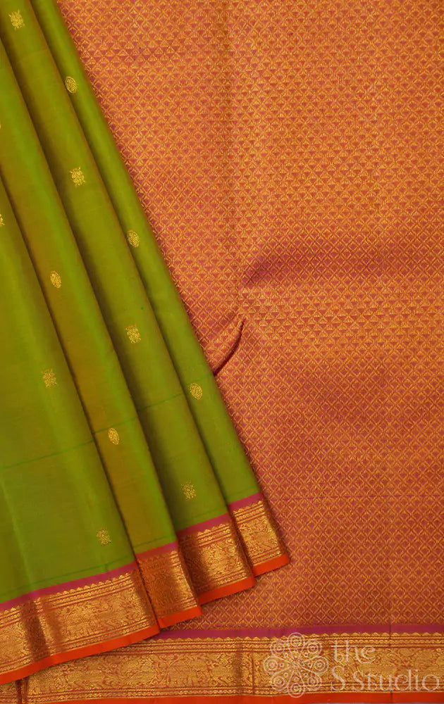 Parrot green kanjivaram silk saree with orange contrast border