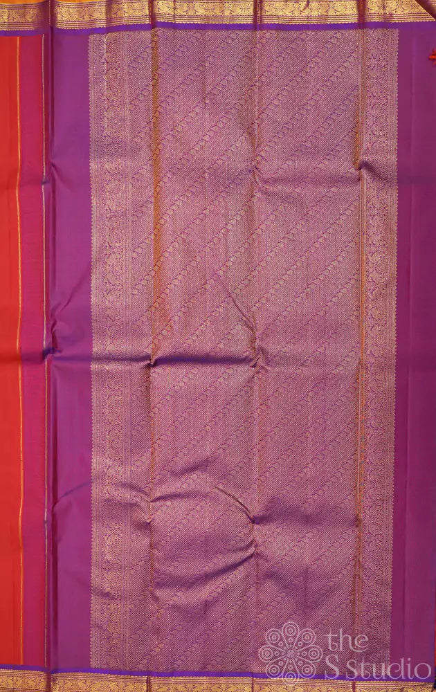 Rust kanchipuram silk saree with purple pallu