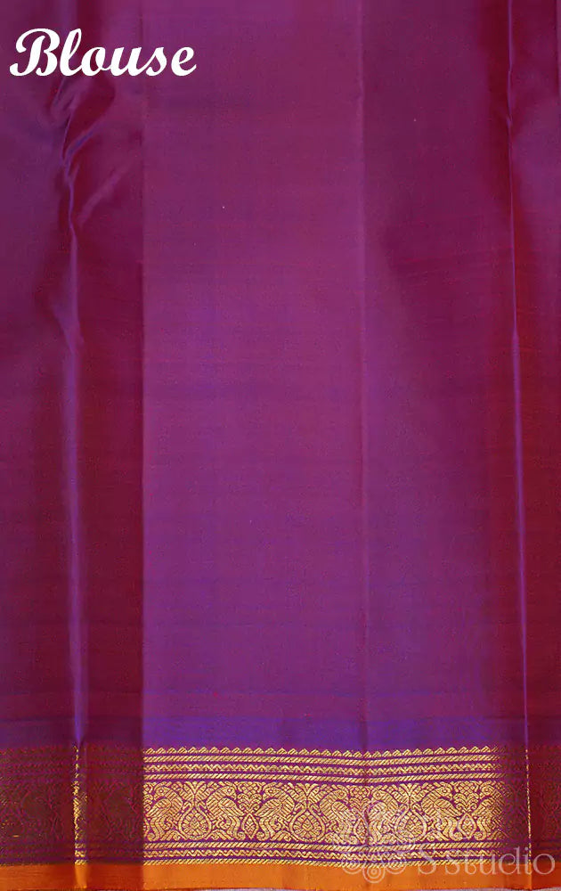 Rust kanchipuram silk saree with purple pallu