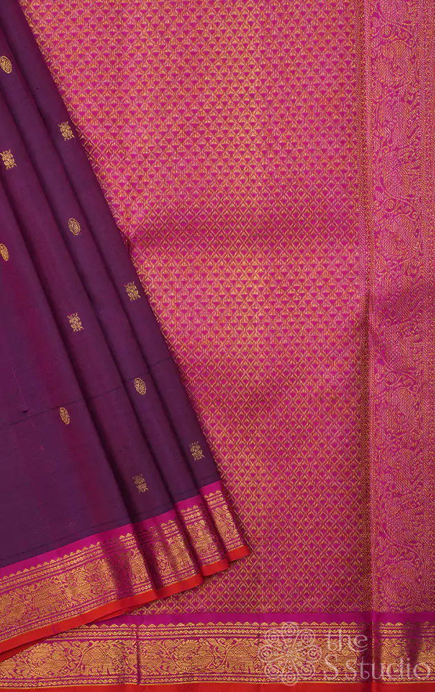 Purple kanjivaram silk saree with rani pink pallu and border