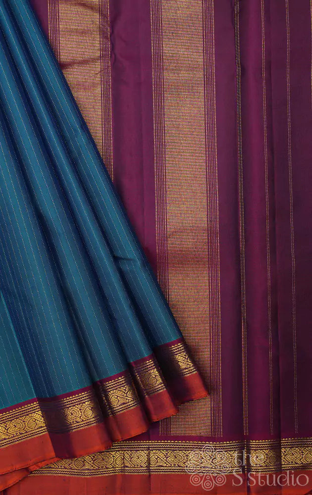 Rama blue kanchi silk saree with vertical thread lines and purple pallu