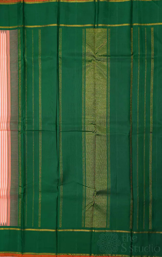 Peach kanchipuram silk saree with green korvai border