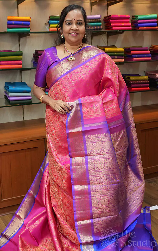 Rani pink checked pattern kanjivaram silk saree with purple border