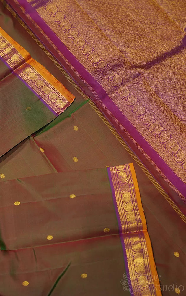 Manthulir green kanjivaram silk saree with purple small border