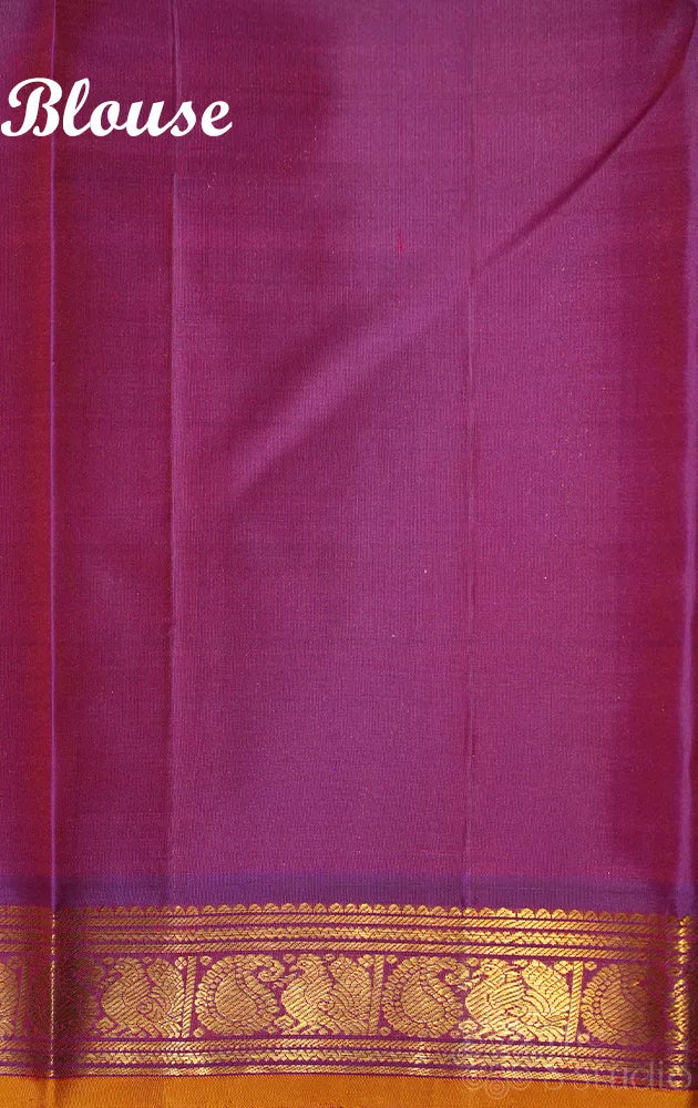 Manthulir green kanjivaram silk saree with purple small border