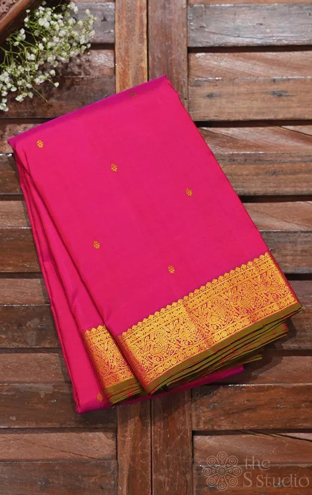 Rani pink kanchipuram silk saree with zari small border